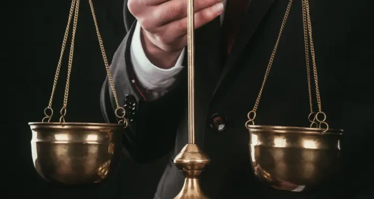cropped-shot-of-lawyer-holding-justice-scales-isol-2024-11-17-10-02-00-utc.webp